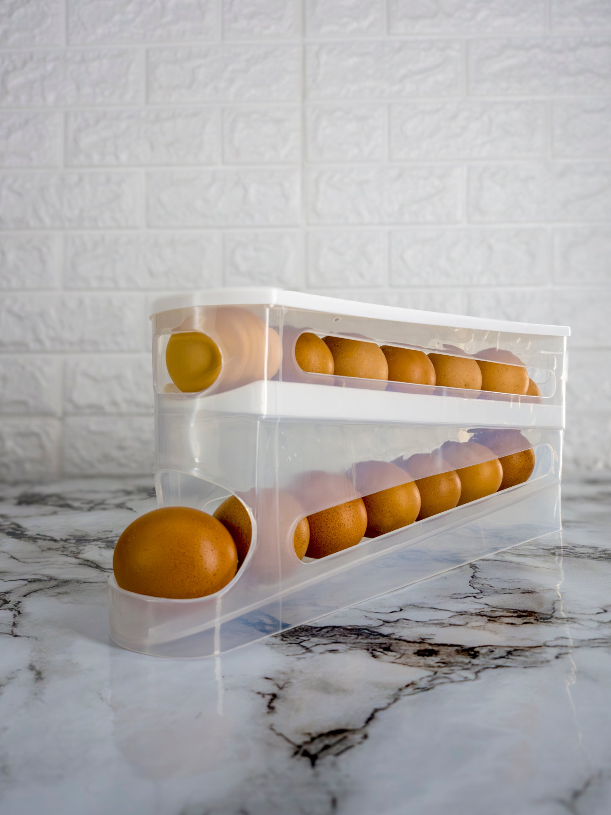 Auto-Rolling Egg Dispenser with Lid